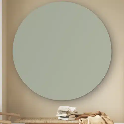 Muurcirkel Mistig blauw aan de muur boven een houten bankje met boeken