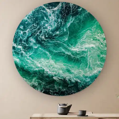 Muurcirkel Oceaan aan de muur boven een houten tafel met theepot