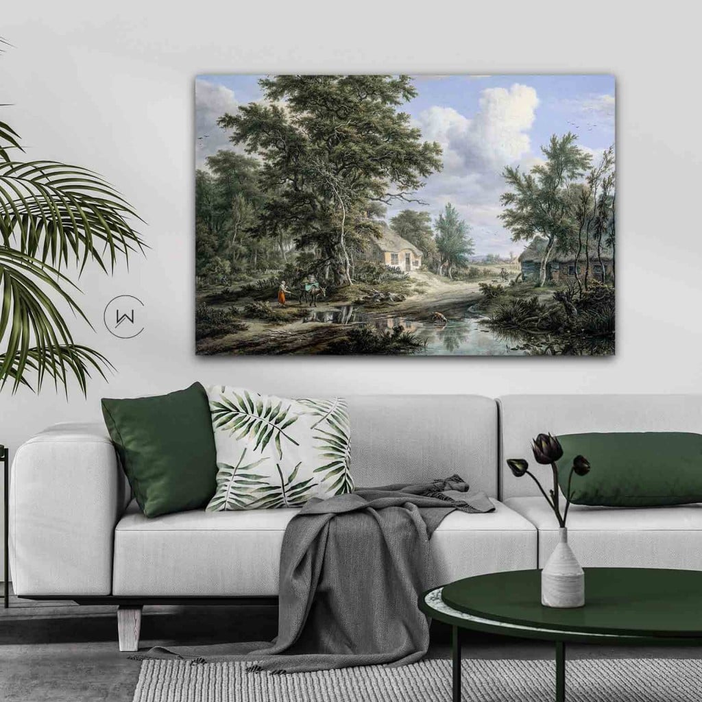 Schilderij van Egbert van Drielst boven een witte bank met groene kussens