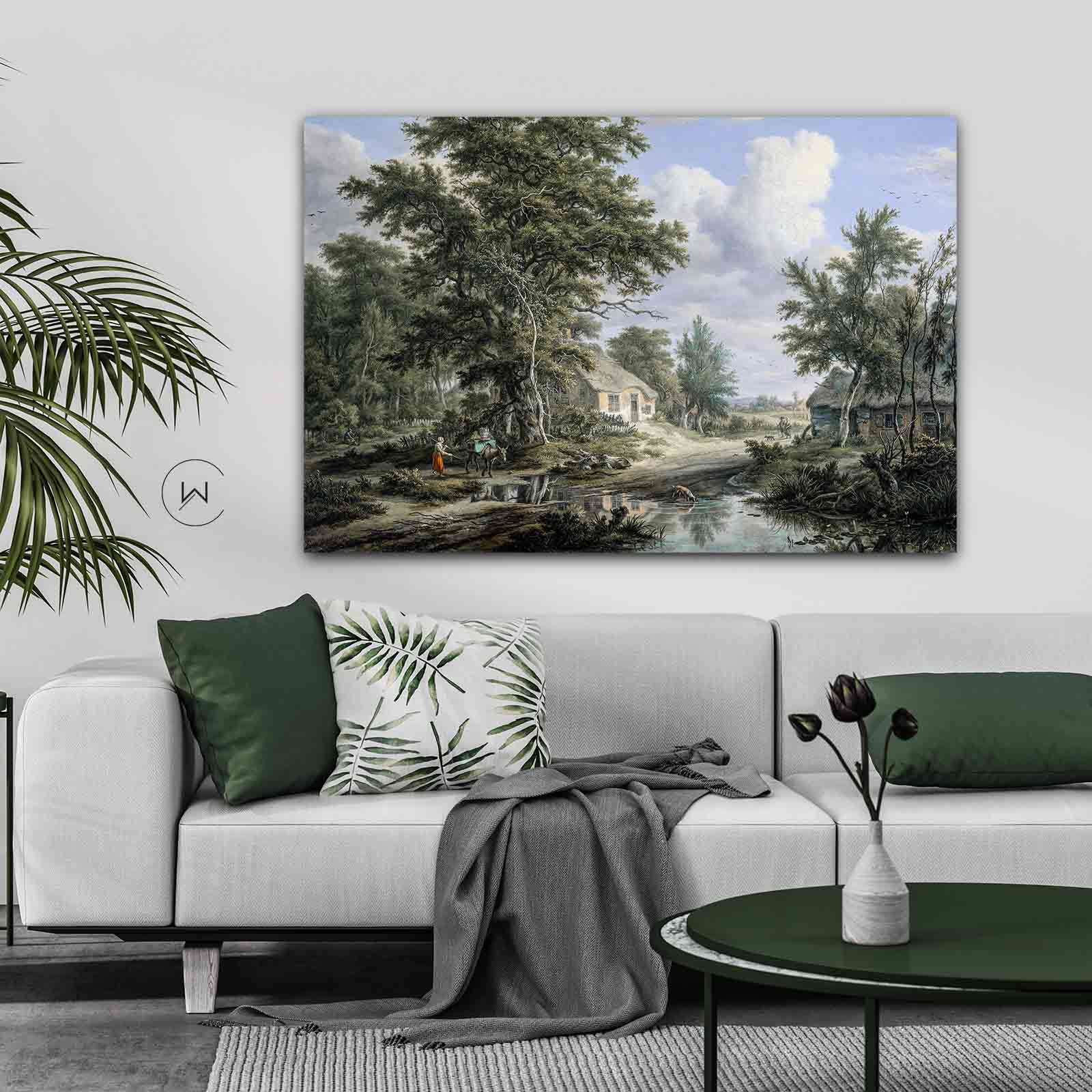Schilderij van Egbert van Drielst boven een witte bank met groene kussens