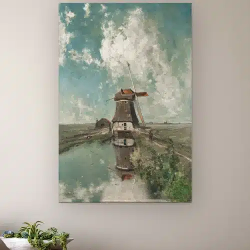 Een molen aan een poldervaart van Paul Joseph Constantin Gabriël aan de muur boven een houten dressoir met planten