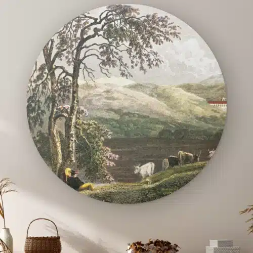 Muurcirkel Siciliaans landschap aan de muur boven een kast met een rieten mandje