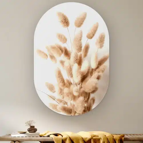 Muurovaal Bunny tail gras aan de muur boven een houten bank met een okergele plaid