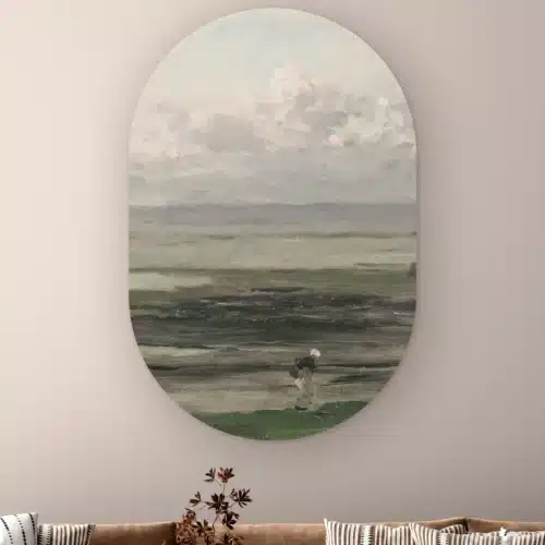 Muurovaal Strand bij eb aan de muur boven een bank met gestreepte kussens