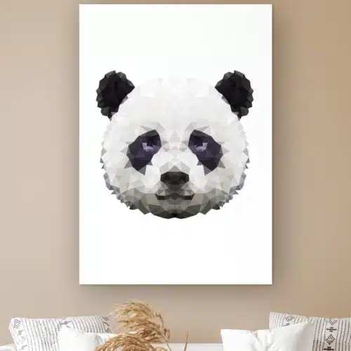 Pixxi panda aan de muur boven een witte bank met kussens