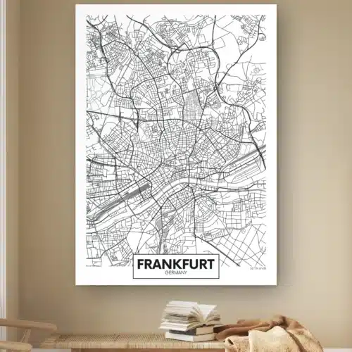 Plattegrond Frankfurt aan de muur boven een houten bankje met boeken