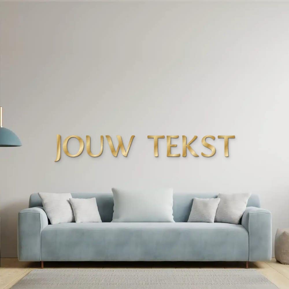 Creëer je eigen zin in goud geborsteld aluminium aan de muur boven een bank