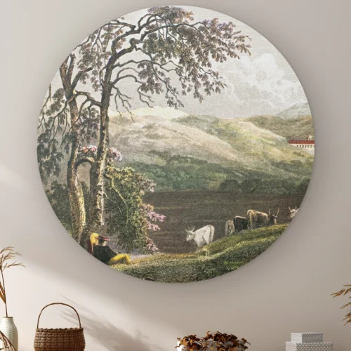 Muurcirkel Siciliaans landschap aan de muur boven een kast met een rieten mandje