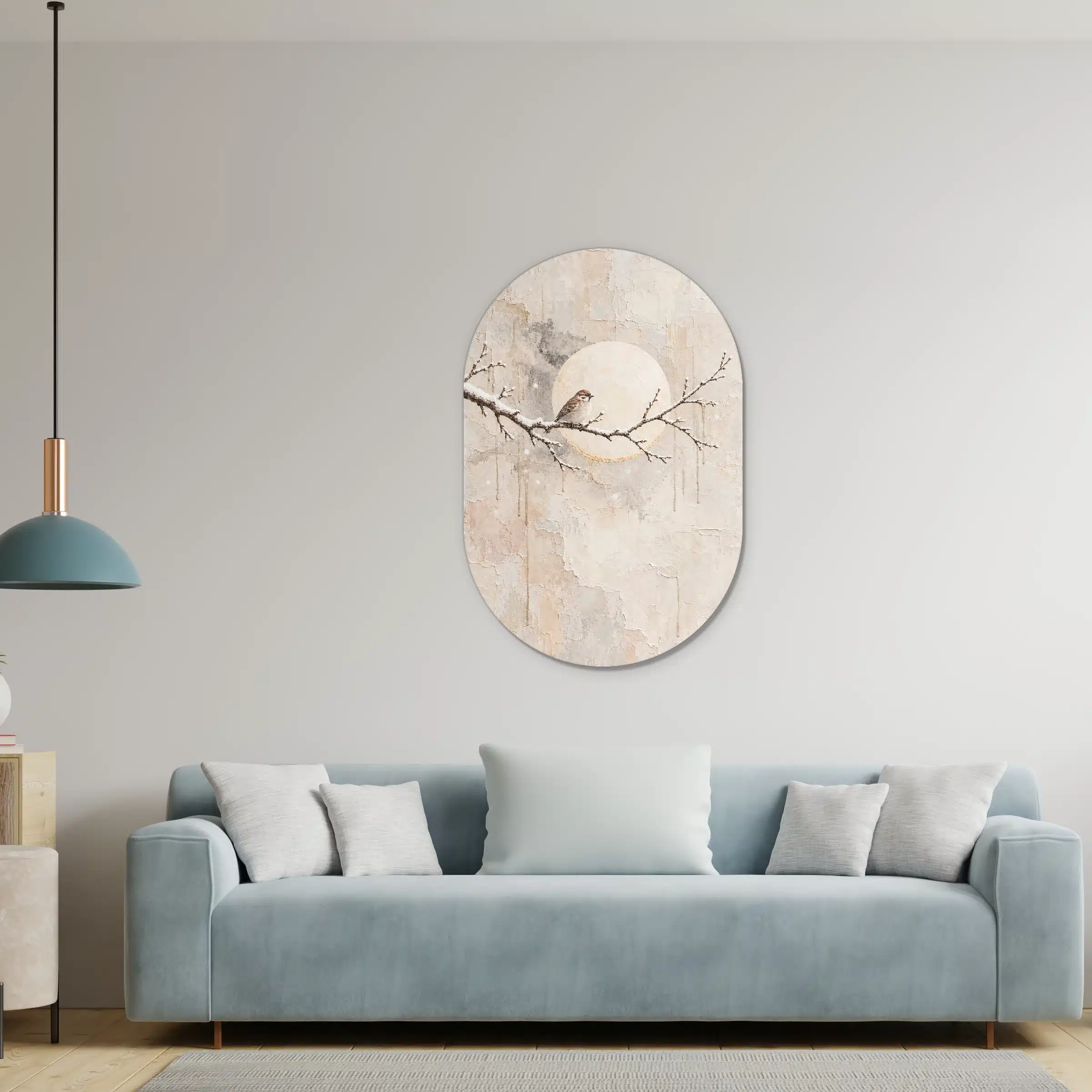 Schilderij maan als muurovaal in een lichte woonkamer boven de bank