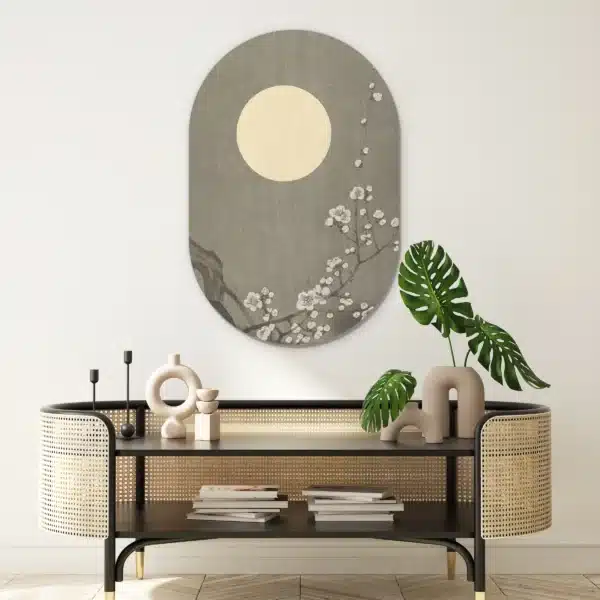 Japanse bloesem schilderij als muurovaal boven een rotan console