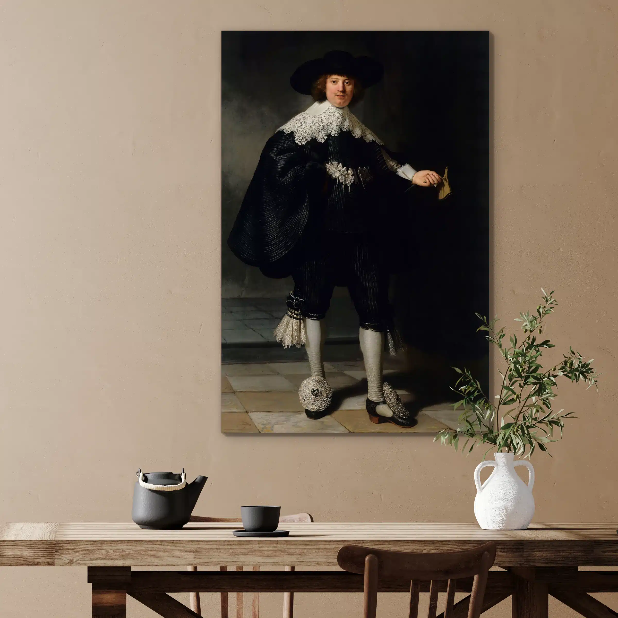 Marten Soolmans van Rembrandt: man in het zwart met kanten kraag, boven een houten eettafel
